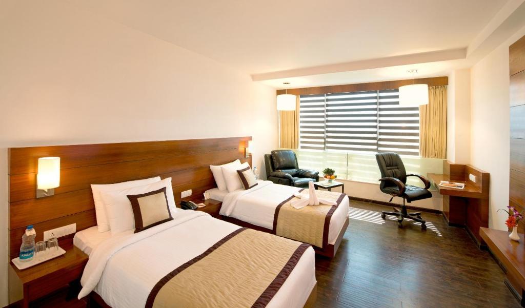 Hotel Sandy'S Tower Bhubaneswar Quarto foto